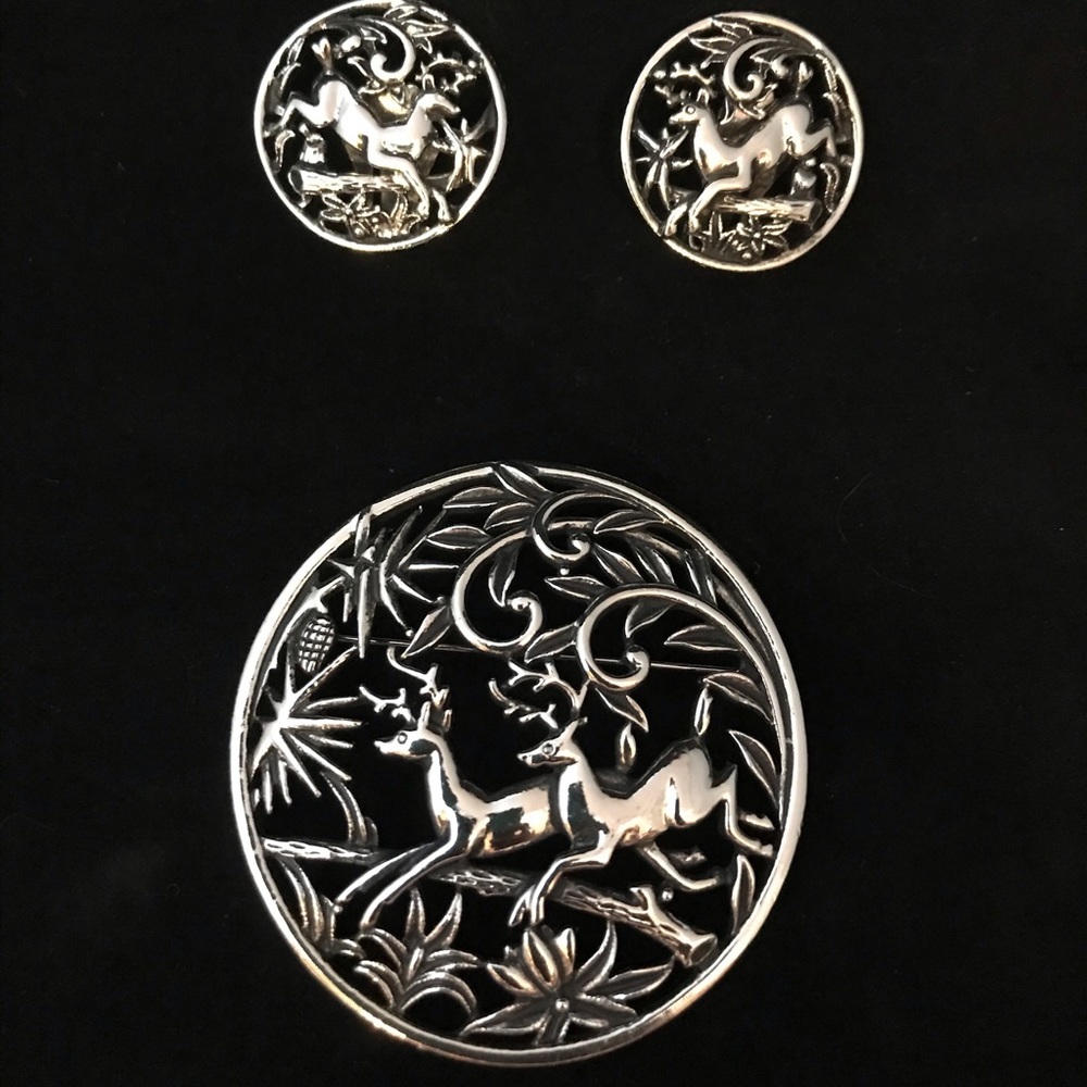 Silver reindeer brooch and earrings vintage